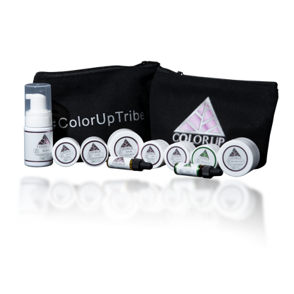 Color Up Skincare Travel Kit with 10 white sample sized skin care products  in front of canvas bag labeled with Color Up logo on transparent background.