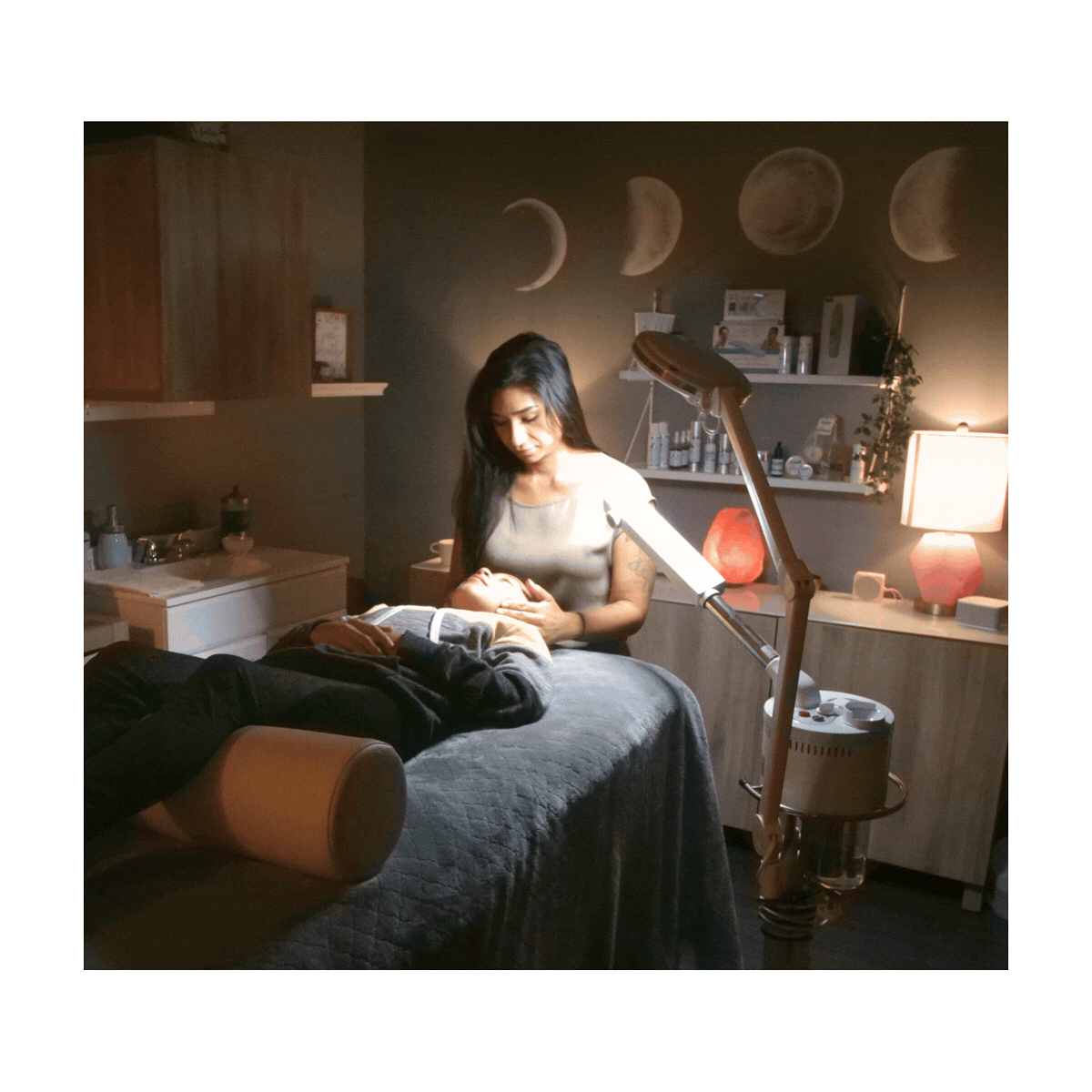 Licensed esthetician, Veronica of NVUS Skin, performing a professional facial treatment in her treatment room using Color Up advanced skincare protocols and botanical skincare products.